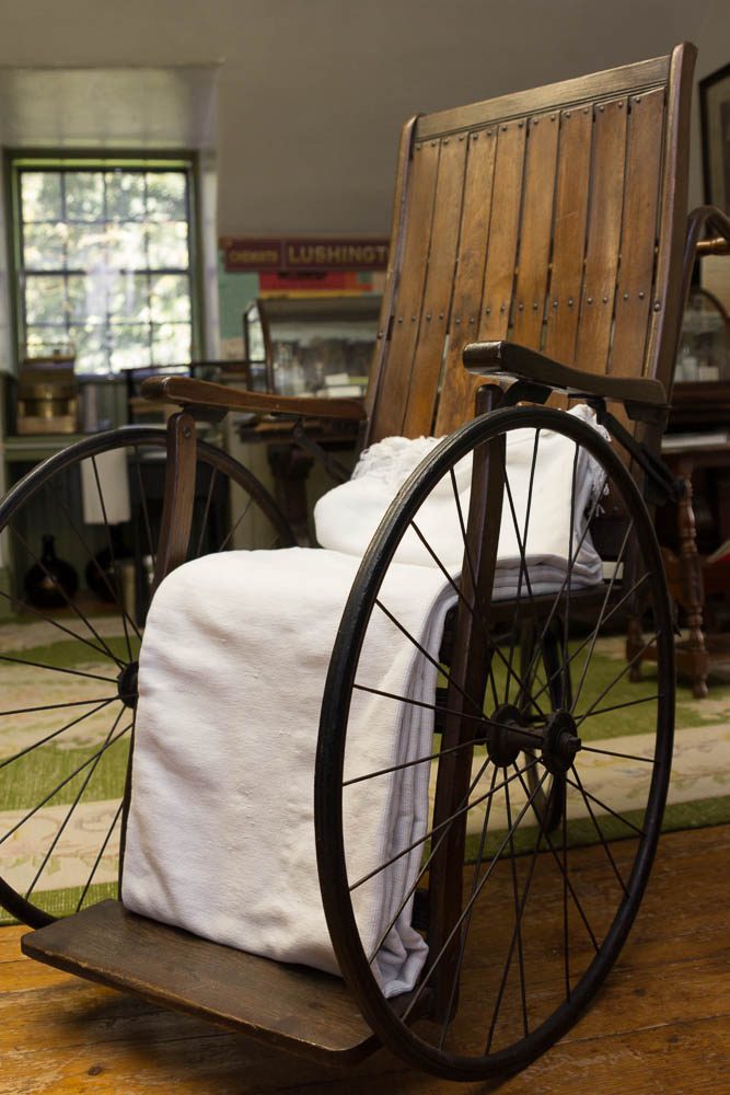 An old fashioned wooden wheelchair