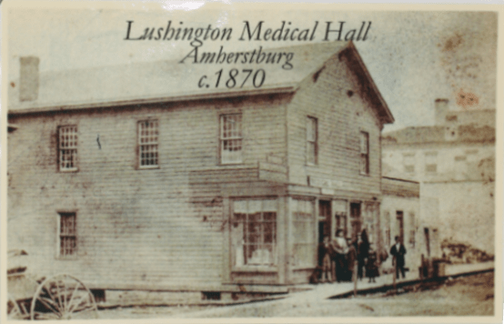 sepia photo of clapboard two storey building