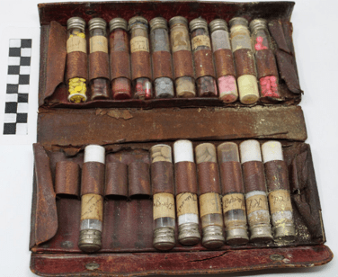 Leather case containg tubes of pills