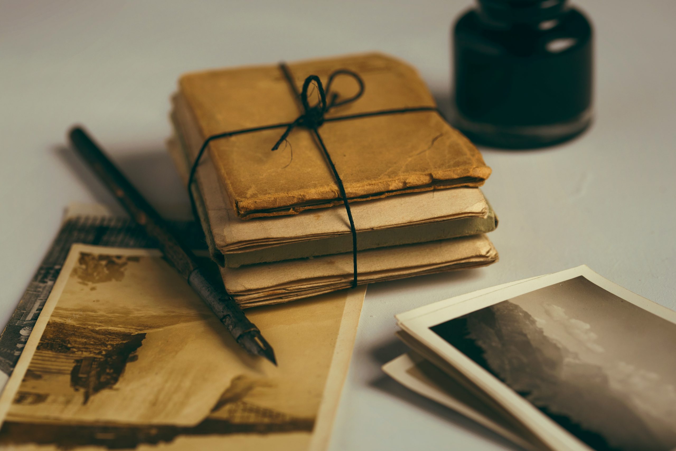 old documents, an ink well and a fountain pen